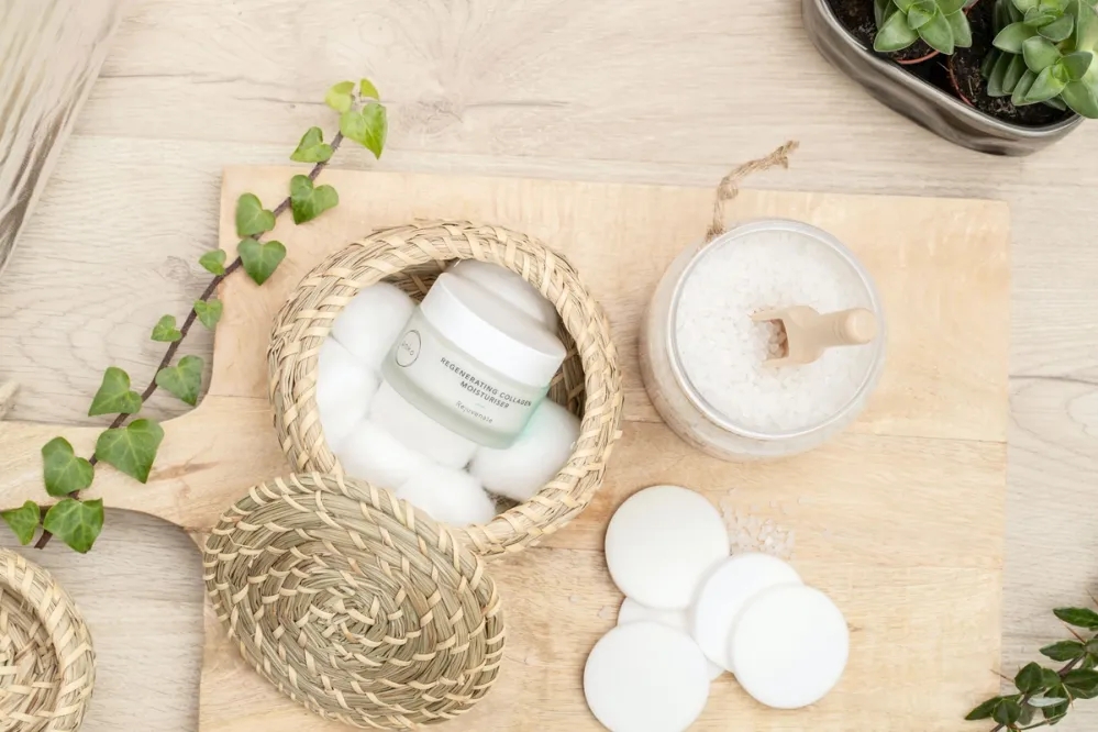 Basket with cotton rounds and some moisturizer
